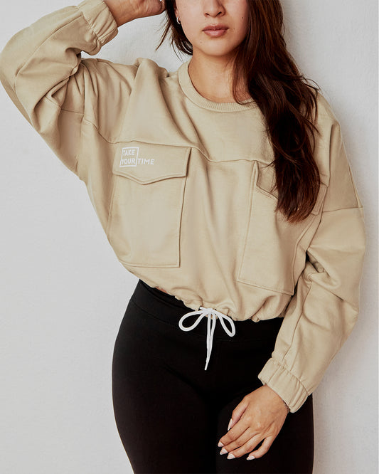 Buzo tipo Crop Aria Beige