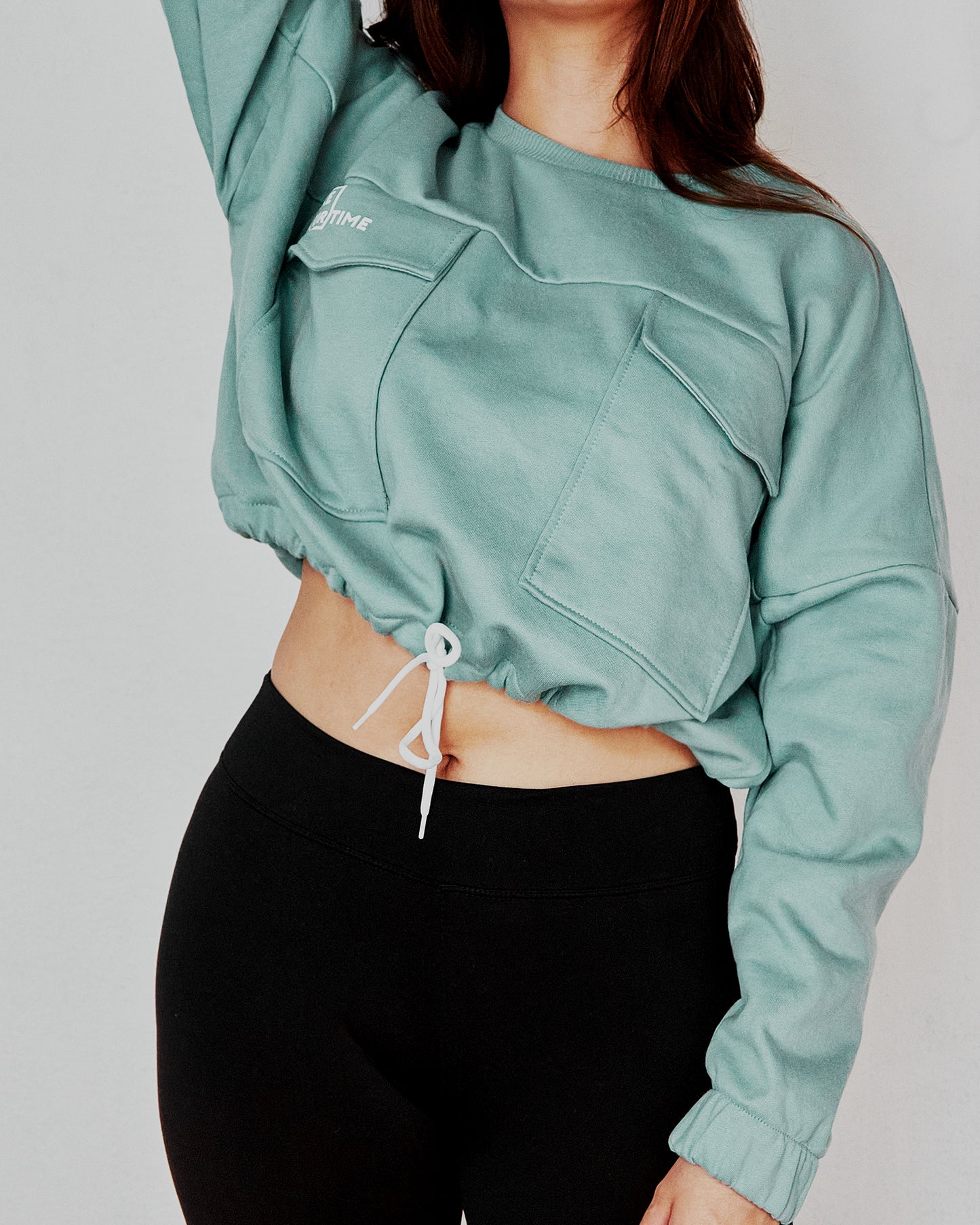 Buzo tipo Crop Aria Celeste